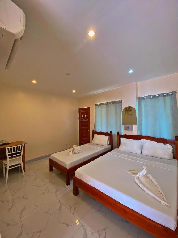 Elnora Delmar Travellers Inn Siquijor Exteriör bild